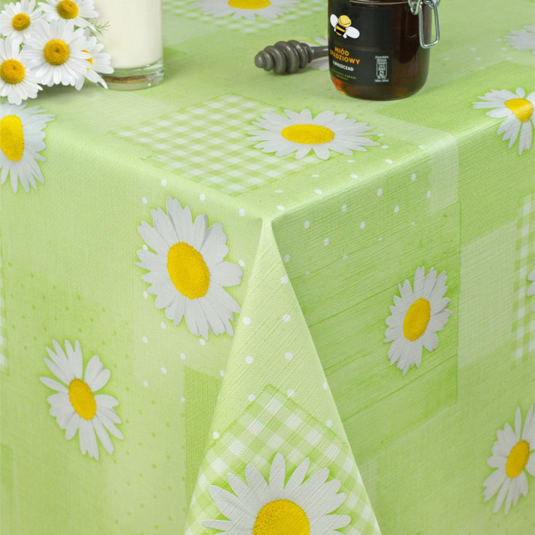Grøn voksdug med margueritter og patchwork