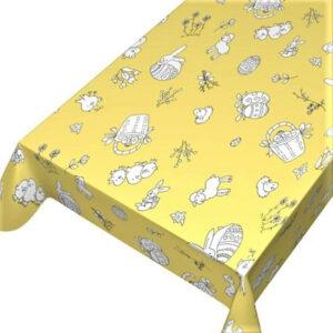 Gul påskevoksdug med påskemotiver