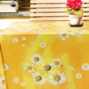 Gul voksdug med flotte margueritter